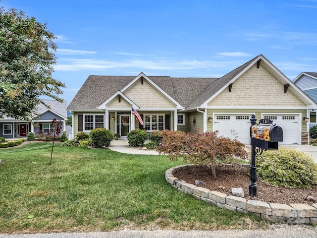 154 N Anvil Ave, Hendersonville, NC 28792 - craftsman-style house featuring a garage, a front lawn, concrete driveway, and roof with shingles