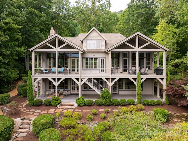 back of property featuring a patio area