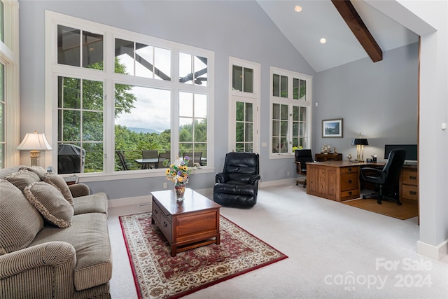 living room featuring carpet flooring, beam ceiling, and high vaulted ceiling