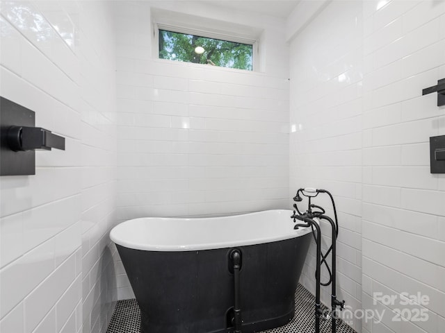 bathroom featuring a tub