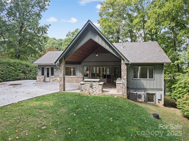 back of house featuring a patio, ceiling fan, and a lawn