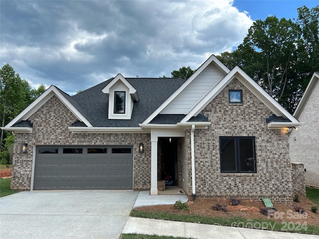 craftsman inspired home with a garage