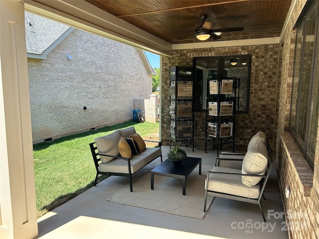 view of patio / terrace featuring ceiling fan