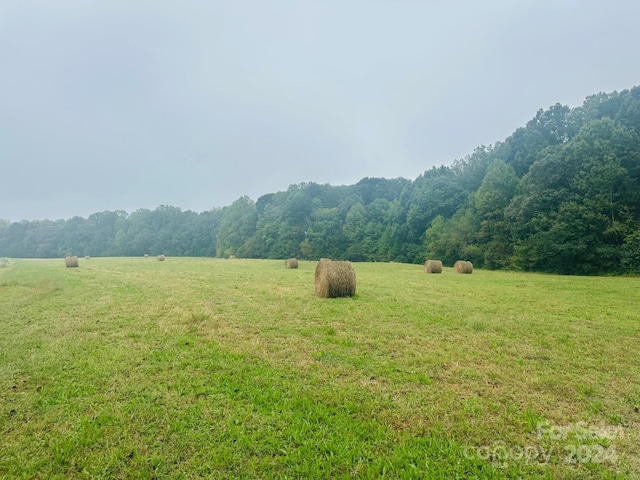 property view of mountains featuring a rural view