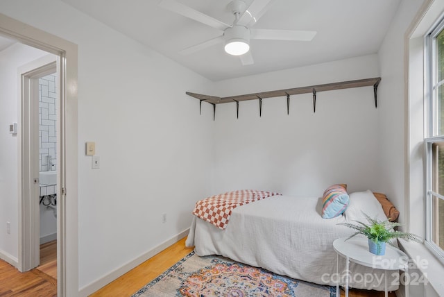 bedroom featuring ceiling fan and hardwood / wood-style flooring