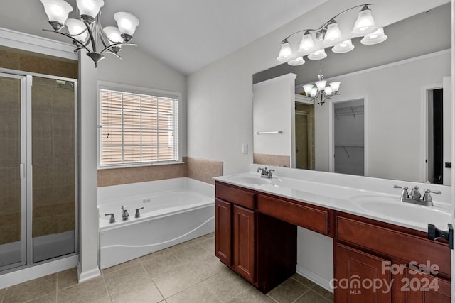 bathroom with tile patterned floors, vanity, independent shower and bath, and lofted ceiling