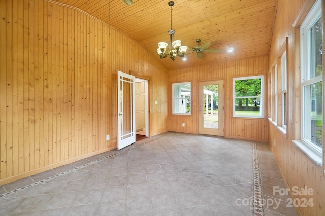 interior space featuring ceiling fan with notable chandelier, lofted ceiling, and wood ceiling