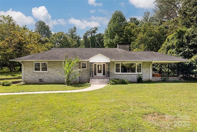 ranch-style house with a front lawn and covered porch