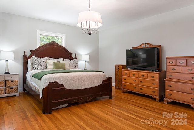 bedroom with light hardwood / wood-style flooring