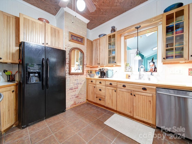 kitchen featuring dishwasher, black fridge, lofted ceiling, hanging light fixtures, and ceiling fan