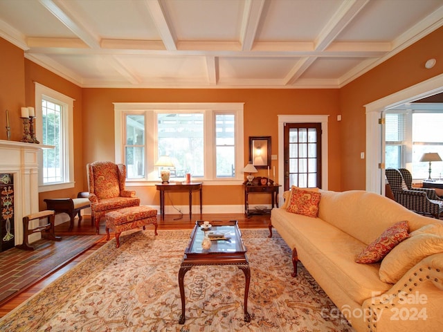 living room with wood-type flooring, beamed ceiling, coffered ceiling, and a high end fireplace