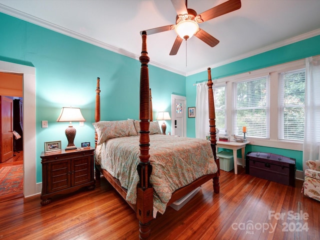 bedroom featuring ceiling fan, hardwood / wood-style flooring, and ornamental molding