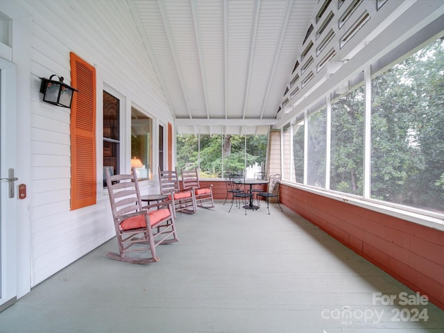 sunroom with vaulted ceiling