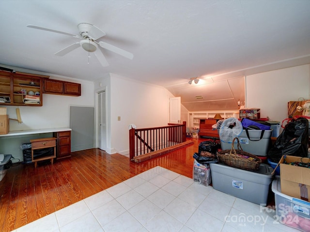 interior space featuring ceiling fan