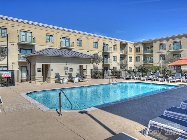 view of pool with a patio area