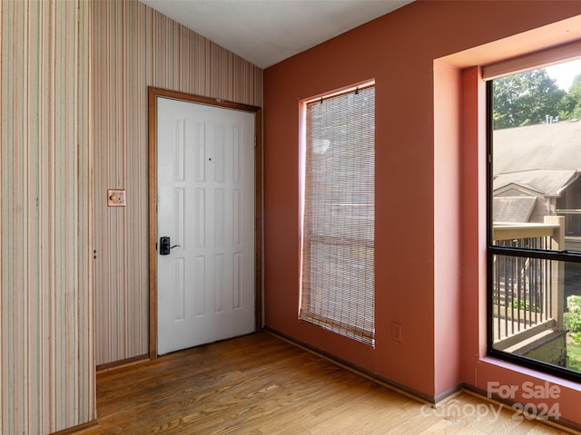 spare room featuring hardwood / wood-style flooring