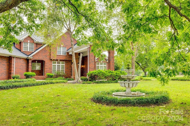 view of front of house featuring a front yard