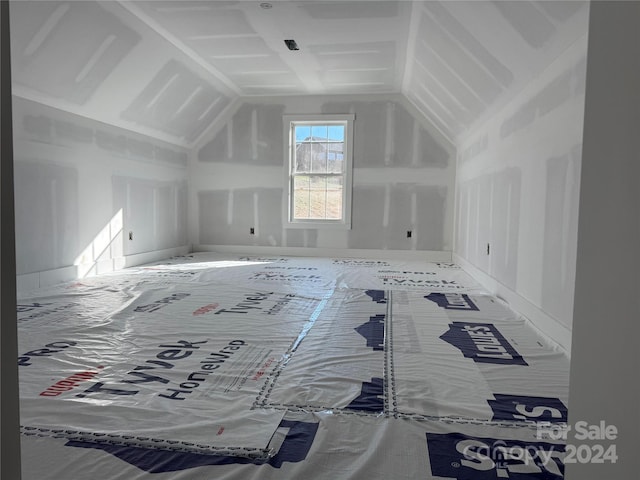 bonus room featuring lofted ceiling