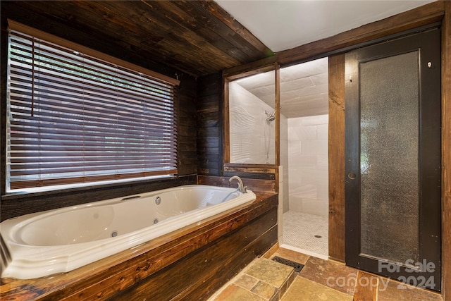 bathroom featuring independent shower and bath and wooden ceiling