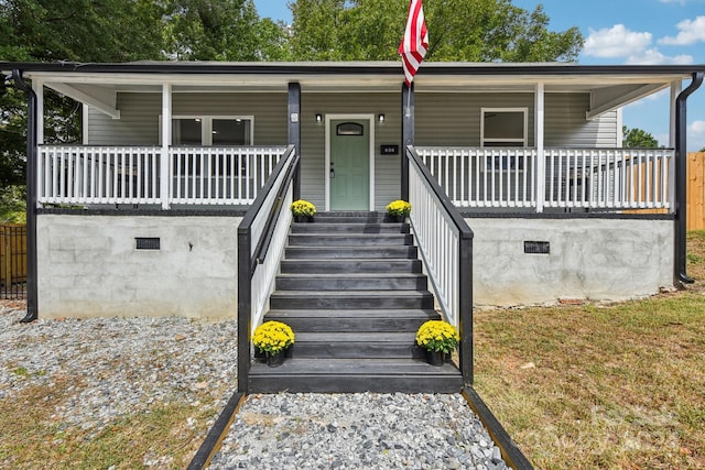 view of front of home featuring covered porch