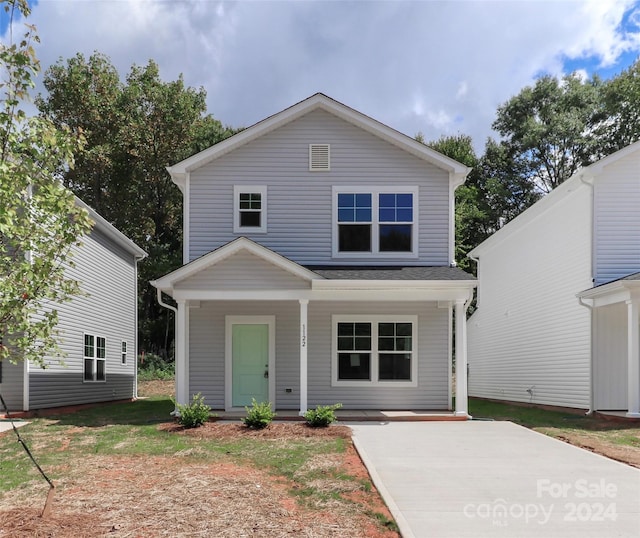 front of property featuring a porch