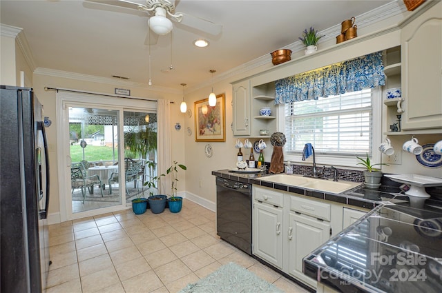 kitchen featuring sink, white cabinetry, black appliances, ornamental molding, and ceiling fan