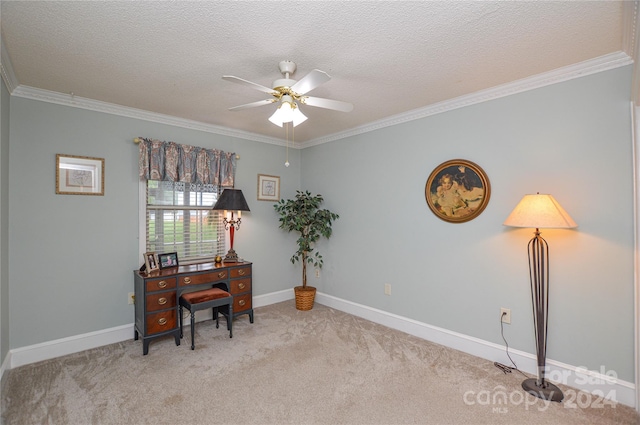 home office with ceiling fan, carpet floors, crown molding, and a textured ceiling