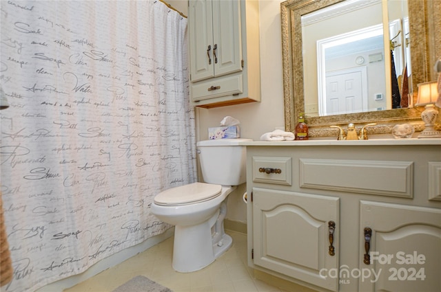 bathroom with tile patterned flooring, walk in shower, vanity, and toilet