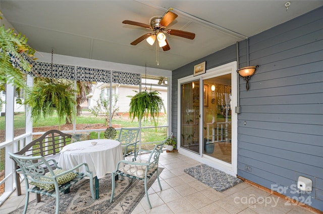 exterior space with ceiling fan