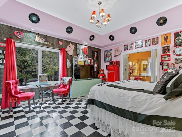 bedroom featuring an inviting chandelier