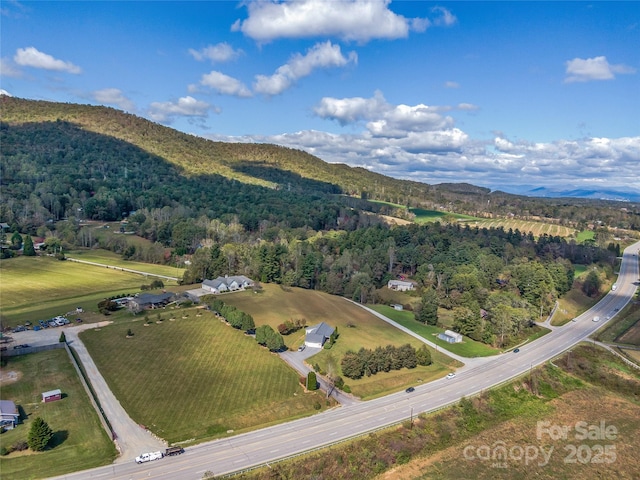 bird's eye view with a mountain view and a rural view