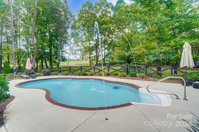 view of pool with a patio area