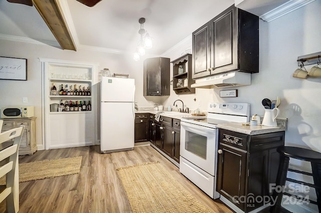 kitchen featuring light wood-type flooring, crown molding, white appliances, and beamed ceiling