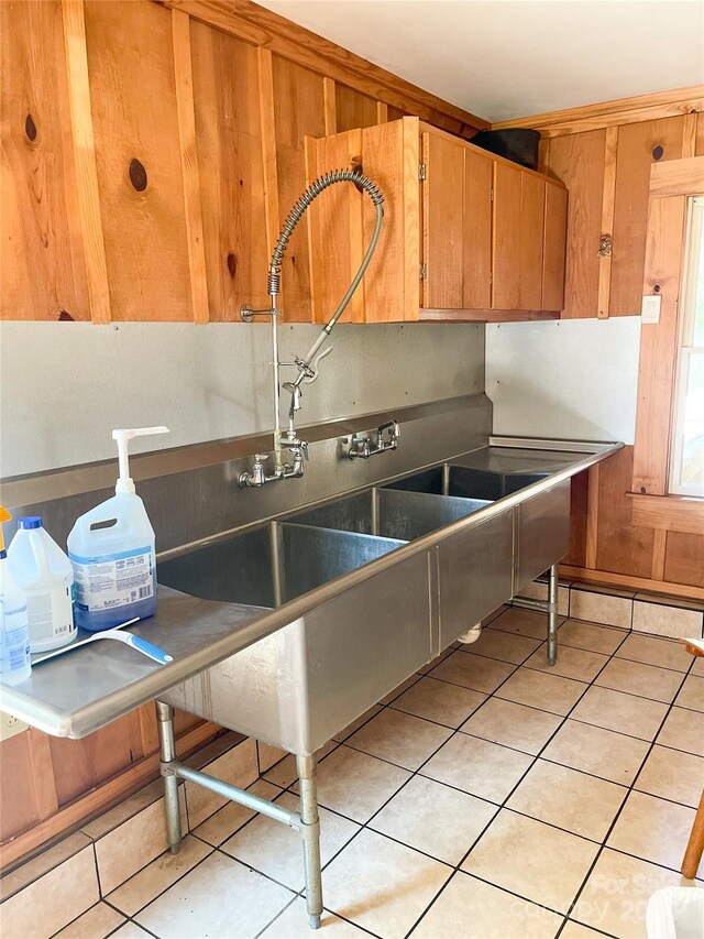 1610 Sierra Rd, York, SC 29745 - kitchen featuring brown cabinets and light tile patterned floors