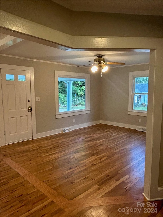 foyer entrance featuring ceiling fan and hardwood / wood-style floors