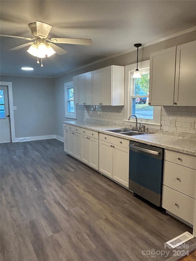 kitchen with white cabinetry, dishwasher, ceiling fan, and decorative light fixtures