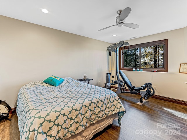 bedroom featuring ceiling fan and hardwood / wood-style flooring