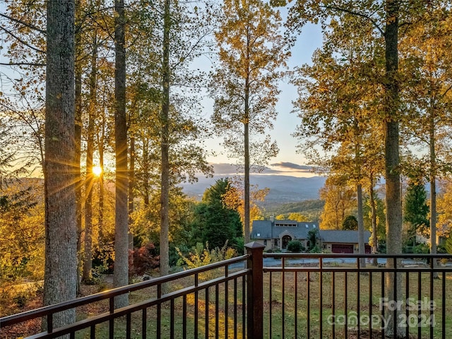 view of balcony at dusk