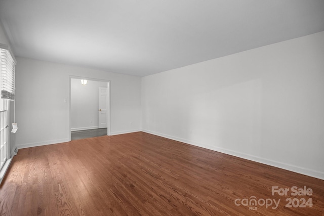 spare room featuring hardwood / wood-style flooring