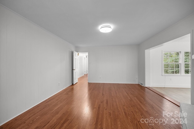 empty room featuring hardwood / wood-style floors