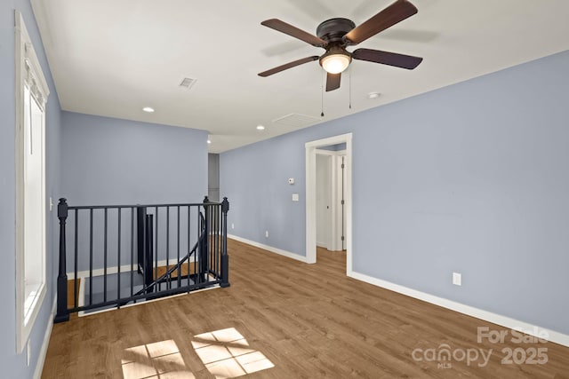 117 Hibriten Mountain Rd SE, Lenoir, NC 28645 - empty room featuring visible vents, baseboards, recessed lighting, wood finished floors, and a ceiling fan