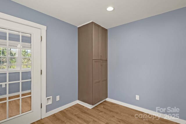 117 Hibriten Mountain Rd SE, Lenoir, NC 28645 - empty room with recessed lighting, light wood-style flooring, and baseboards