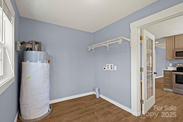 117 Hibriten Mountain Rd SE, Lenoir, NC 28645 - washroom with washer hookup, baseboards, and light wood-type flooring