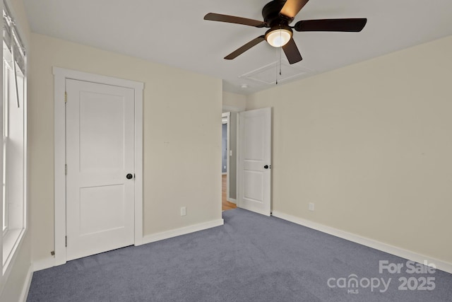 117 Hibriten Mountain Rd SE, Lenoir, NC 28645 - unfurnished bedroom with baseboards, ceiling fan, and carpet flooring
