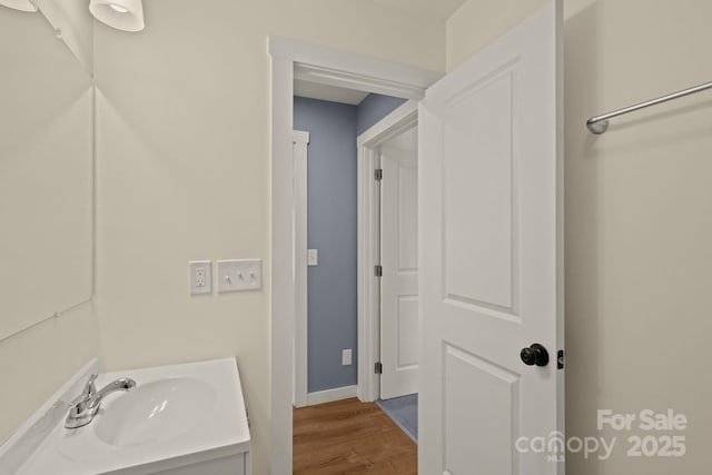 117 Hibriten Mountain Rd SE, Lenoir, NC 28645 - bathroom with vanity and wood finished floors