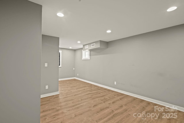 117 Hibriten Mountain Rd SE, Lenoir, NC 28645 - basement featuring recessed lighting, light wood-style flooring, visible vents, and baseboards