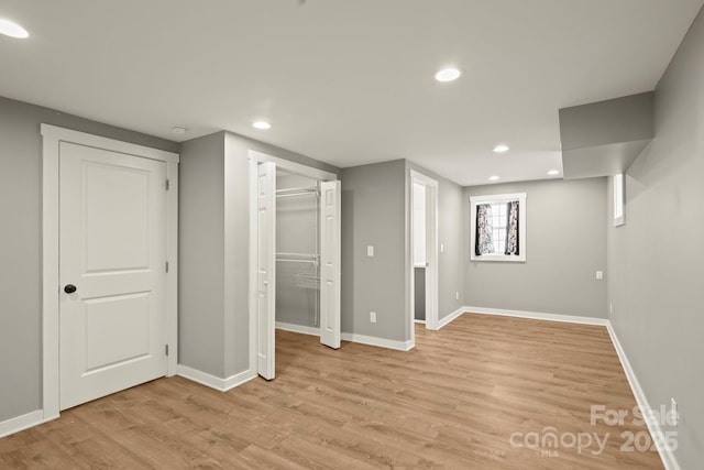 117 Hibriten Mountain Rd SE, Lenoir, NC 28645 - unfurnished bedroom featuring light wood finished floors, recessed lighting, and baseboards