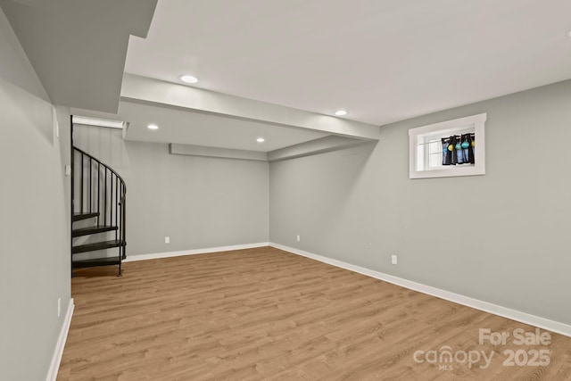 117 Hibriten Mountain Rd SE, Lenoir, NC 28645 - below grade area with recessed lighting, baseboards, wood finished floors, and stairs