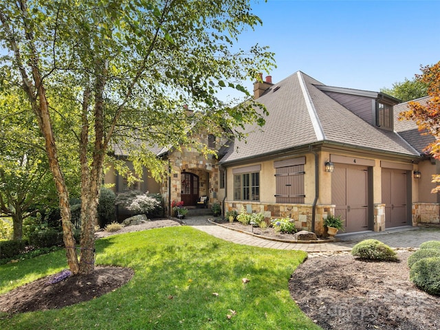 4 Windelsham Way, Arden, NC 28704 - view of front of house with stone siding, a front lawn, stucco siding, a chimney, and a shingled roof