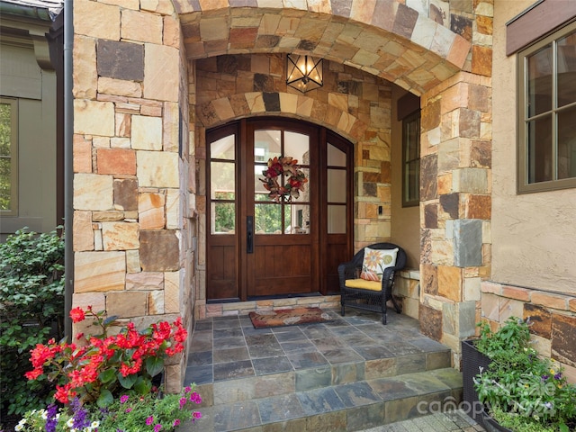 4 Windelsham Way, Arden, NC 28704 - doorway to property featuring stone siding